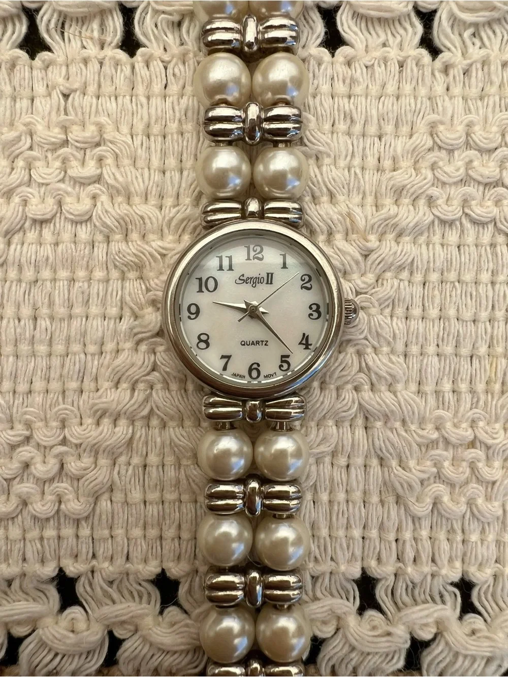 Vintage pearl bracelet watch with timeless charm